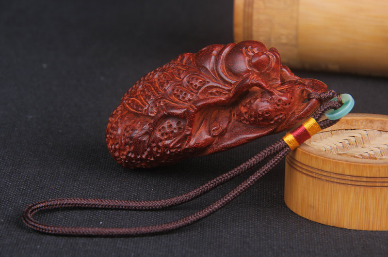 Fame and fortune lobular rosewood handle